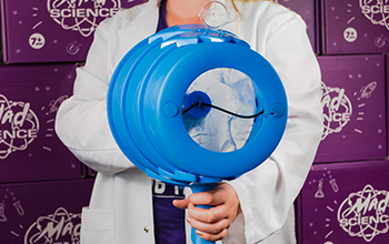 Mad Scientist holding an airzooka or vortex generator.